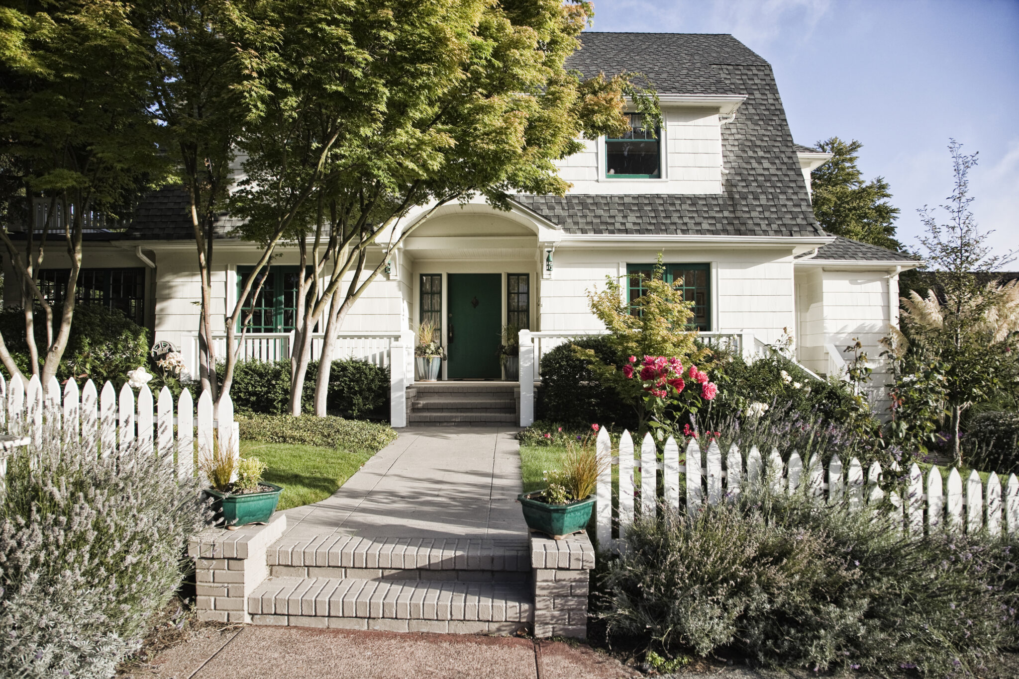 a house with a white picket fence
