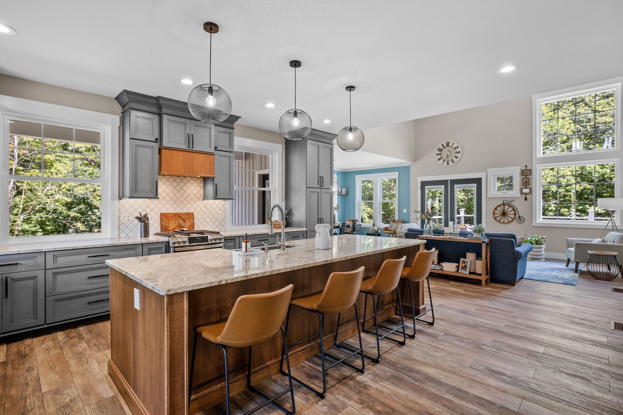 a kitchen with a large island and a large kitchen